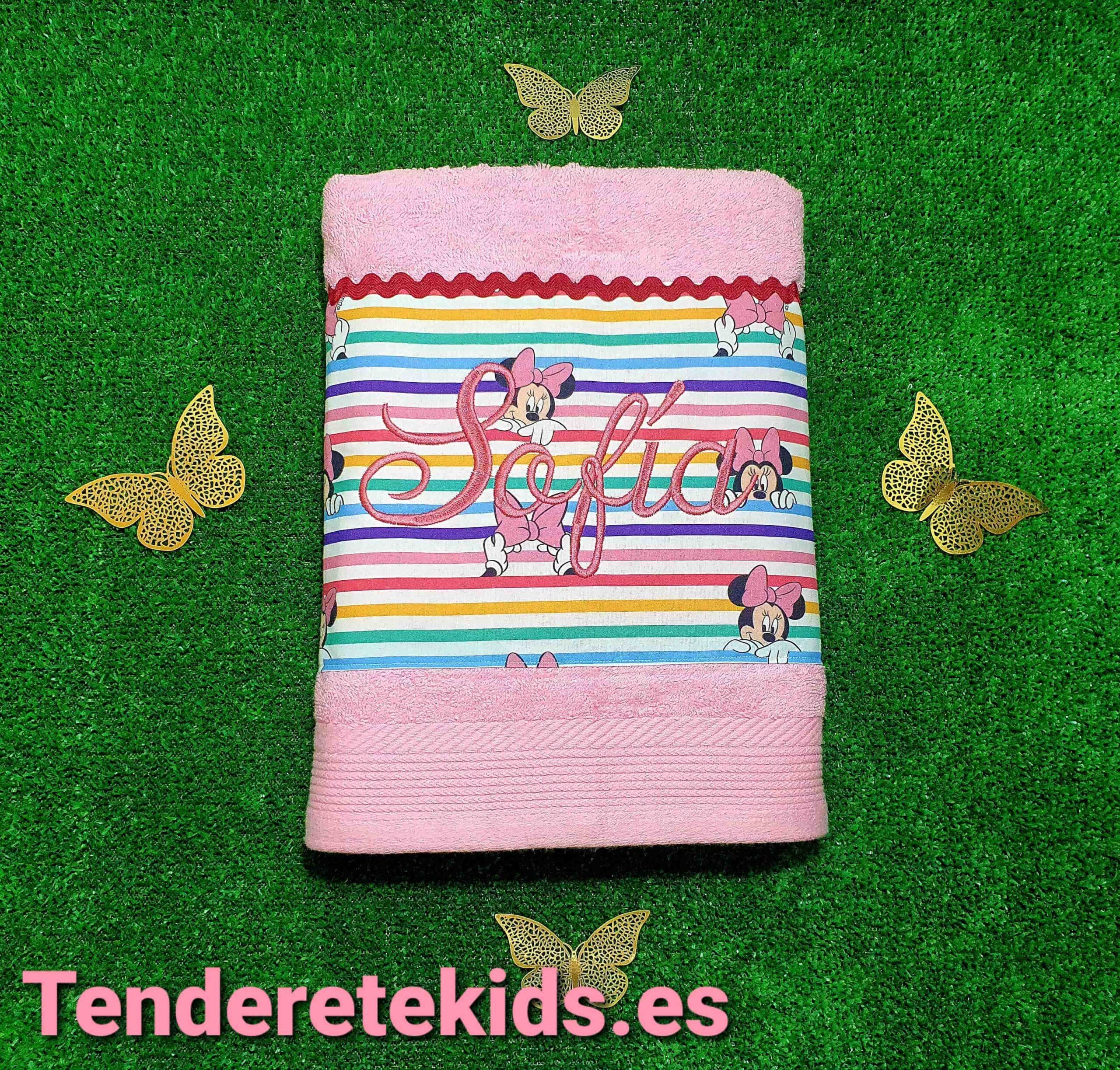 Toalla rosa bebé con banda de tela estampado rayas de colores minnie personalizable con nombre